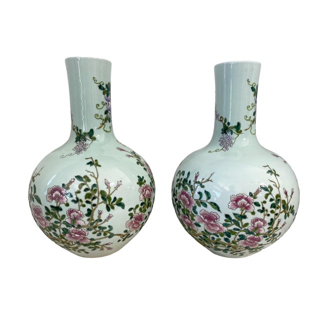 Superb Chinoiserie Onion-shaped vintage Vases features hand-painted birds, grapes, wisteria, and peonies.and stands 16.75"...