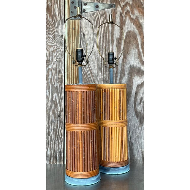Illuminate your space with coastal charm using this pair of Vintage Pencil Reed Table Lamps. Inspired by classic American...
