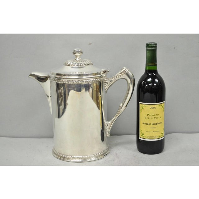 Antique English Victorian Silver Plated Enamel Lined Large Beverage Water Pitcher. Circa Early 20th Century. Measurements:...