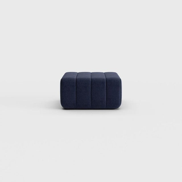 Pouf, stool, ottoman—or simply the building block for what is probably the world’s most versatile sofa system? The Curt...