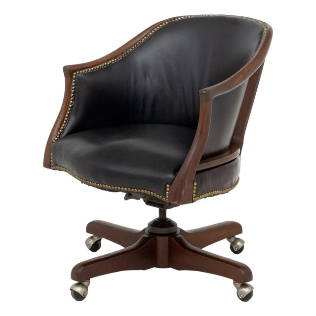 Modern Leather Upholstered Mahogany Swivel Chair For Sale