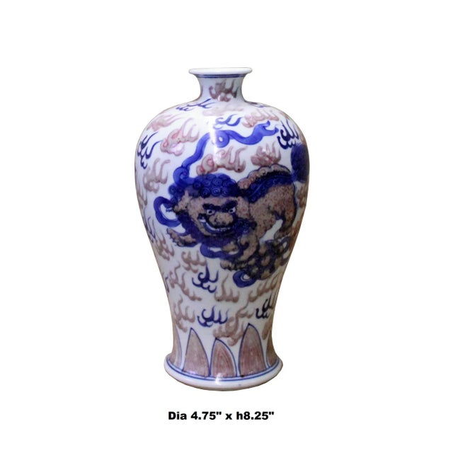This is a handmade Chinese blue and white and red porcelain small vase. The surface is handpainted precise oriental Foo...
