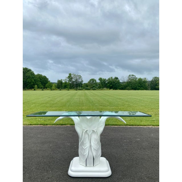 Fabulous Hollywood Palm Regency console sofa table featuring a tropical banana leaf design. This dramatic sculptural table...
