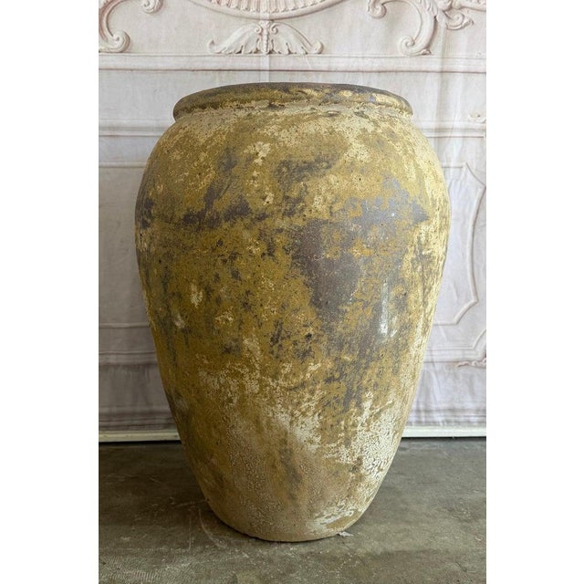 Atmospheric Mediterranean style olive jar, prized for its monumental form and its exquisitely complex, worn surface. Known...
