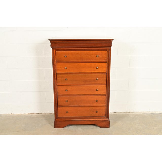 A gorgeous French Louis Philippe style seven-drawer highboy dresser or chest of drawers By Grange France, 1997 Beautiful...