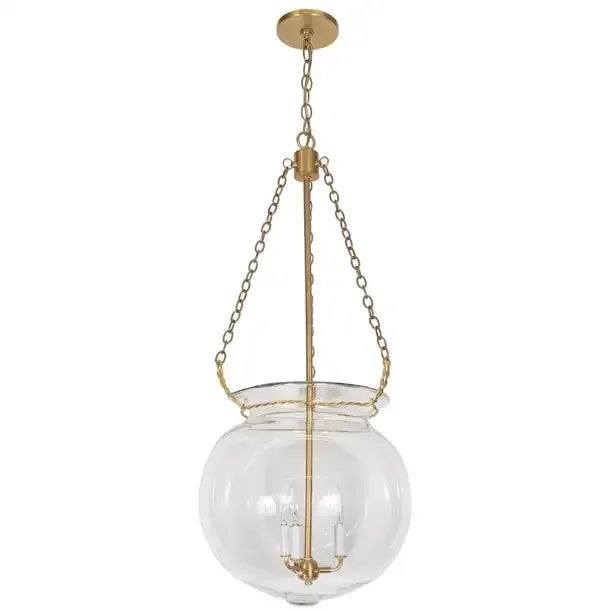 "Fishbowl" glass and brass pendant with wrought details.