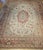 This oversize vintage Turkish Oushak rug from the early 20th century is an exceptional piece of Anatolian weaving in a...