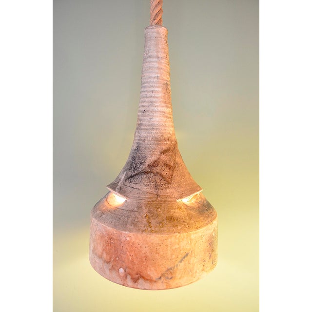 Studio ceramic piece from Germany, created in the 1970s and 80s and belonging to the Brutalist movement. This pendant lamp...