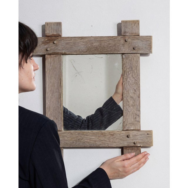 A mirror whose natural bleached oak, chunky cross joinery gives it real character at first glance. It was made in France...