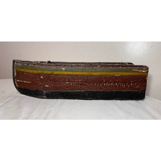 This exquisite antique model boat is a unique piece of Folk Art, hand-carved from wood with intricate polychrome detailing...