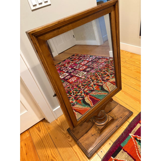 19th Century French cheval, or psyche mirror made of solid walnut with a beautiful wood grain and patina. Large and grand...