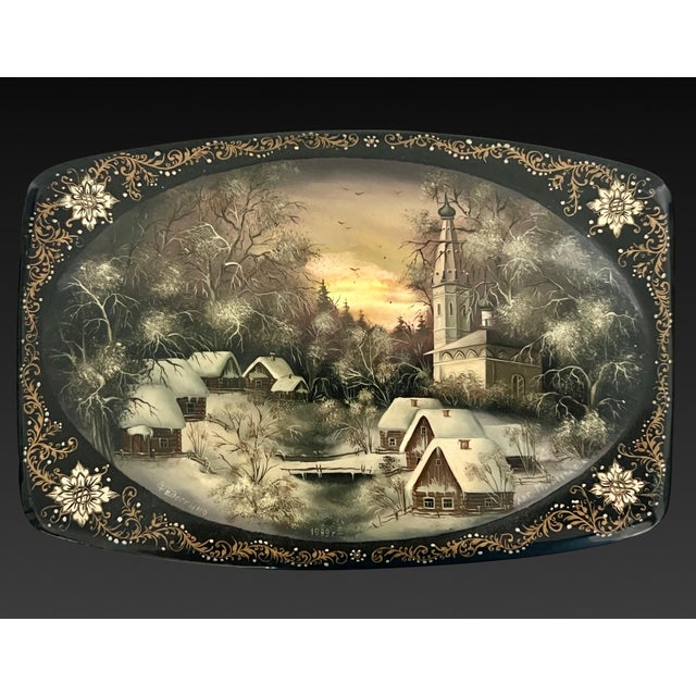 A superior and very high quality Russian Lacquer Box with two exquisite miniature snowy winter scenes - a traditional...