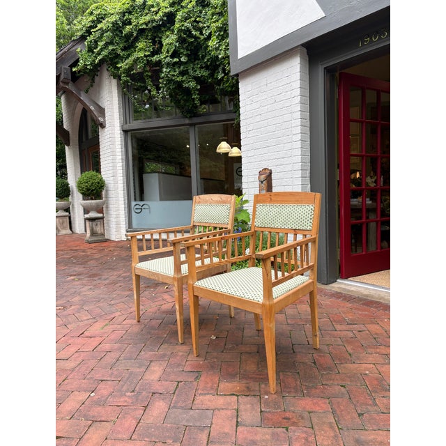 A unique pair of Scandinavian armchairs crafted in Sweden circa 1950s, featuring sculptural solid pine frames with...