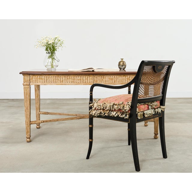 Opulent writing table or desk in the neoclassical style designed by Nancy Corzine. The Laurel desk features a thick,...