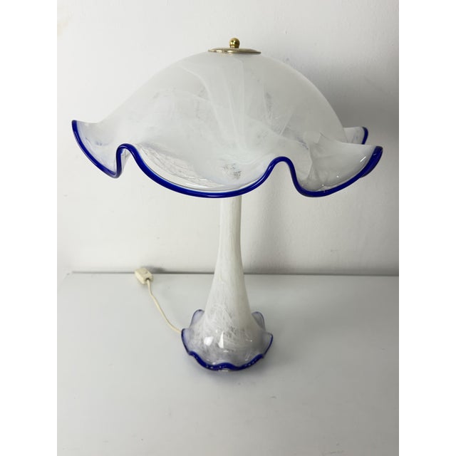 Large Venetian Murano glass table lamp, 1960 Milk white with a cobalt blue trim. Gold-plated metal frame. Marked "Murano...