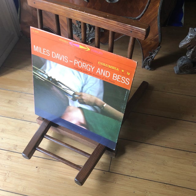 Beautifully carved wooden display rack, great for showcasing works of art or collections.