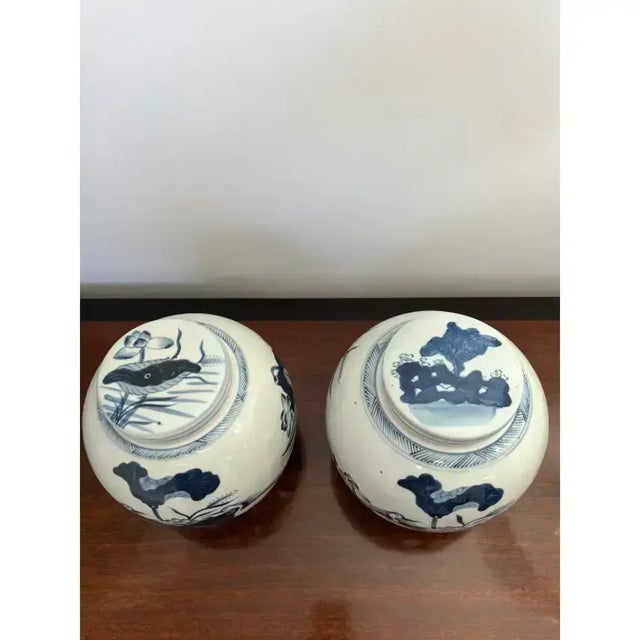 Pair of Mid 20th Century Blue and White Ginger Jars With Coastal Depictions of Cranes, Water and Shore Grass For Sale - Image 4 of 6