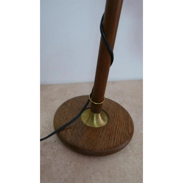 Model 84 Table Lamp in Brass and Oak by Temde, 1970s, in Flawless conditions. Designed 1970 to 1979 This piece has an...