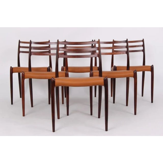 6 Dining Table Chairs Model 78. Designed in 1962 by Niels Otto Møller and very quickly became a sought-after chair. The...