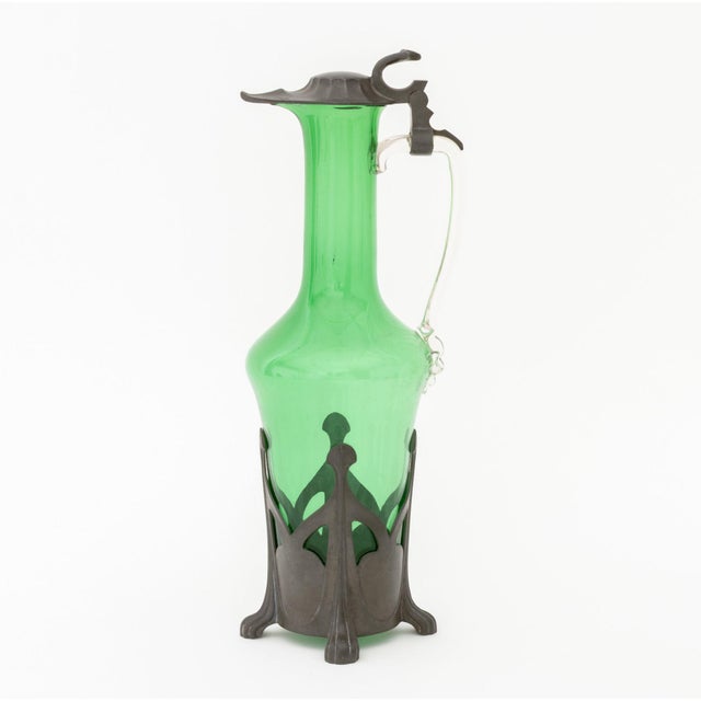 Collection of Four Arts and Crafts Vessels, circa 1900, comprising: a copper trip jug and two-handled bowl, an Art Nouveau...