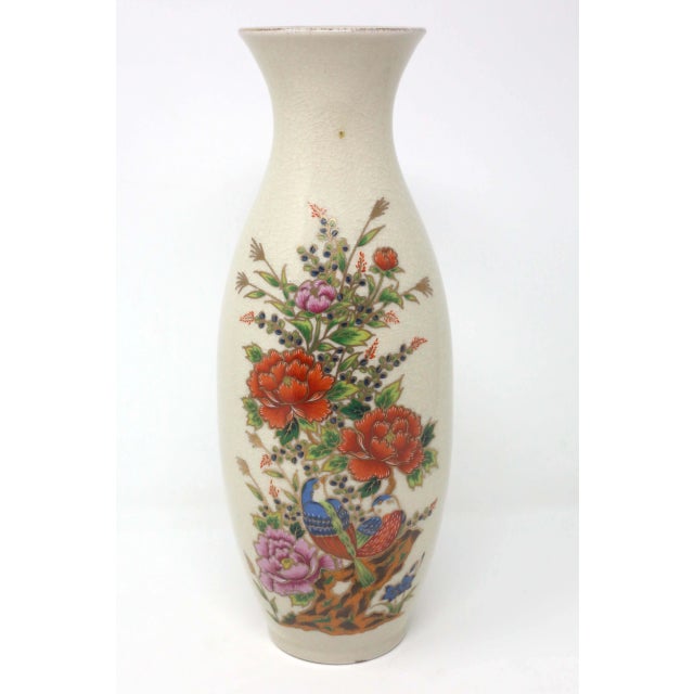 A vintage, ceramic vase with beige crackle finish, and flowers and birds design. Japanese stamp. Some wear of the gold...