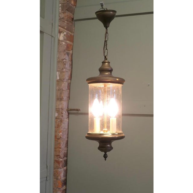French Brass and Glass Lantern Hall Light A traditional old lantern, the light has a cylindrical glass shade, and a twin...