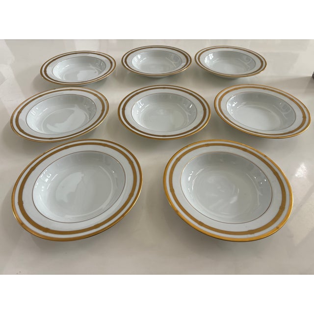 Stunning subtle Dior insignia on the plate with gold detailing. This creates a beautiful contrast against the bone color....