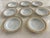 Stunning subtle Dior insignia on the plate with gold detailing. This creates a beautiful contrast against the bone color....