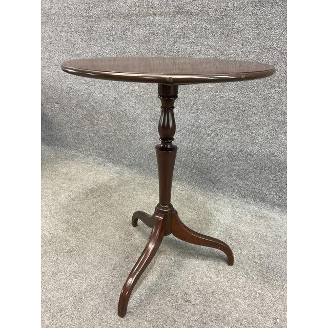 A high-quality mahogany side table / end table / night stand that is very sturdy, perfect for a lamp or vase or even as...