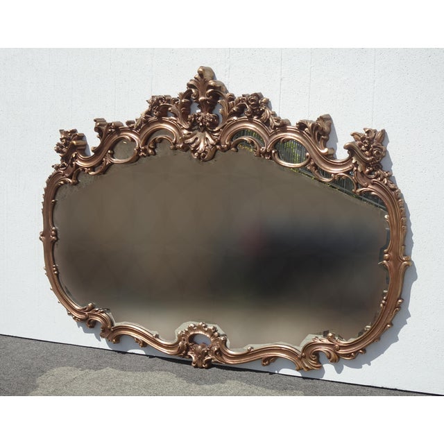 Gorgeous Mirror in Good Vintage Condition. Solid and Firm. Wear is usual for its age. Please study the photos and ask...
