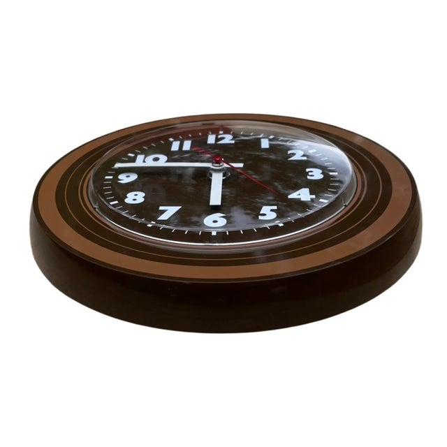 Weimar wall clock type S2032/2 made in Germany in the 1970s. Modernist style clock with a dial covered with a spherical...