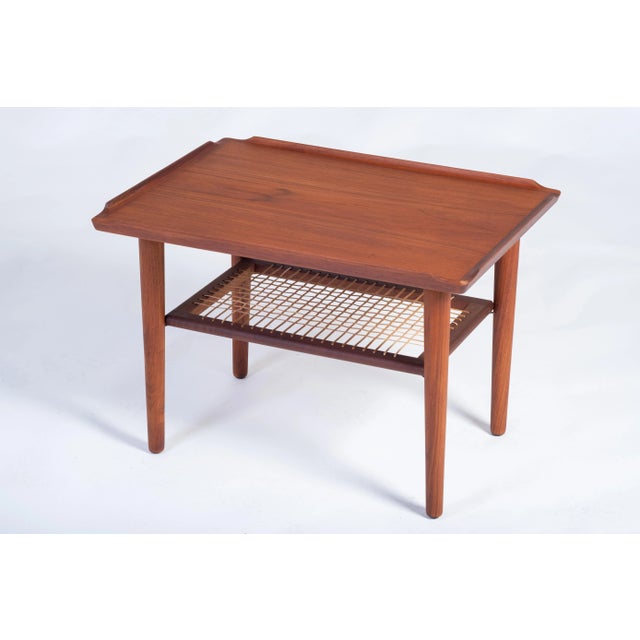 Side/coffee table in teak attributed to George Jensen, Danish design, 1960s. Beautiful table with raised edges and a...
