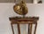 An Italian brass and copper lantern with beveled glass panels, surmounted by a pierced foliate crown gallery. Retains its...