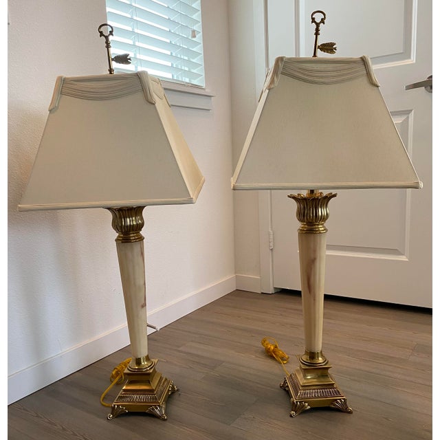 Absolutely Beautiful brass and ivory lamps. These will go great with any interior designers home decor and room. Excellent...