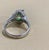 Green 1.8 Carat Oval Tsavorite and 1.0 Carat Diamond Ring in Platinum Estate Size 6 For Sale - Image 8 of 18