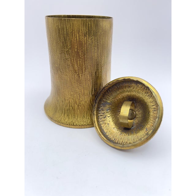 A solid brass humidor made by Bradley & Hubbard, known for their high-quality American metalwork. The surface has a...
