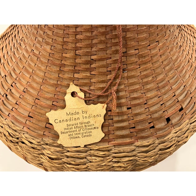This vintage Indian Basket was made by the Onibwe tribe in the twenties There is a label attached in French and English...