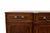An English sideboard by Trosby Furniture of Sussex, showcasing traditional craftsmanship and refined detailing...