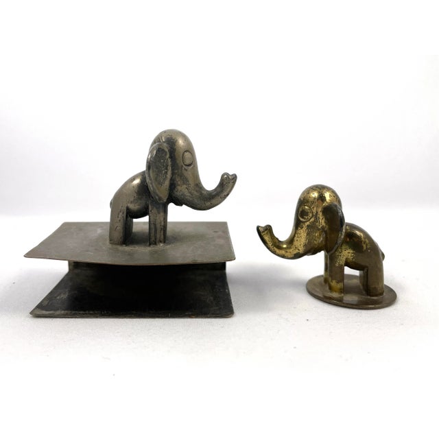 A pair of Hagenauer Elephants! The brass piece is a figurine, while the pewter is a matchbox cover/holder. Designed by...