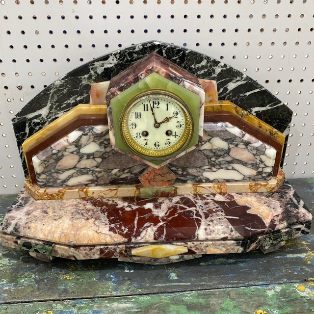 Beautiful and very impressive French art deco marble specimen clock. Very unusual size, with over 10 diffrent species of...
