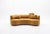 This John Mascheroni curved sofa, is an elegant piece of modern furniture that adds a touch of sophistication to any...