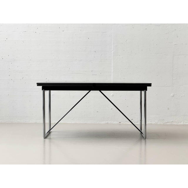 The elegant, technically sophisticated libera extendable table, designed in 1993 by christoph hindermann for victoria-...