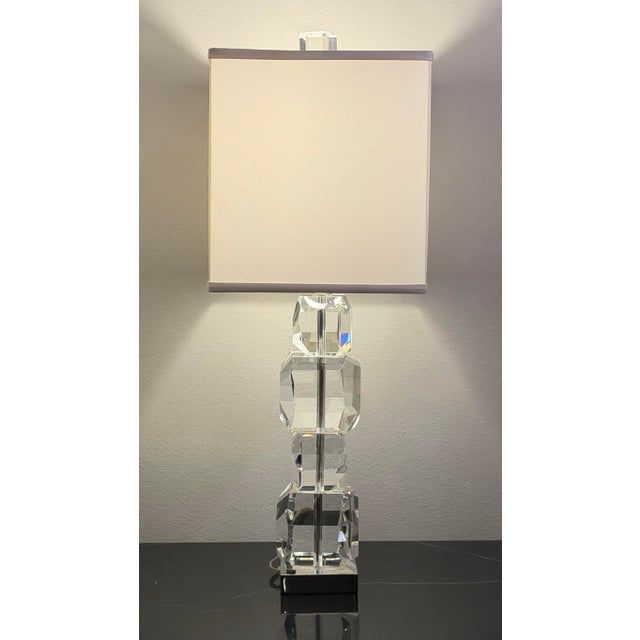 The elegant stacked gemstone table lamp by global views features thick crystal faceted blocks stacked upon each other....
