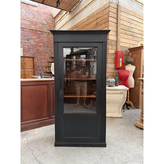 This 19th-century display cabinet has been fully restored. It features a large glass door covering two-thirds of its...