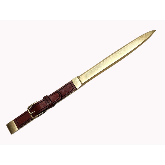 Mid-20h century golden brass and leather letter opener/knife by the luxury design house Hermès Paris, France By: Hermès...