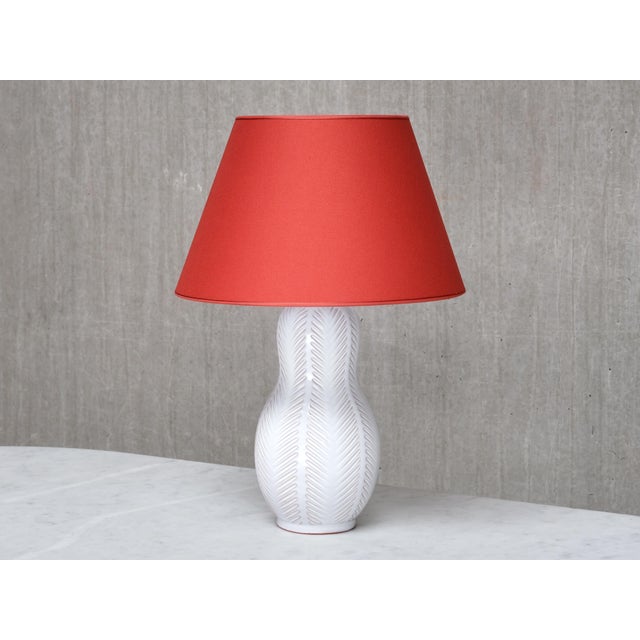 This rare table lamp was designed by Anna-Lisa Thomson and produced by Upsala-Ekeby in Sweden in the 1940s. The gourd-...
