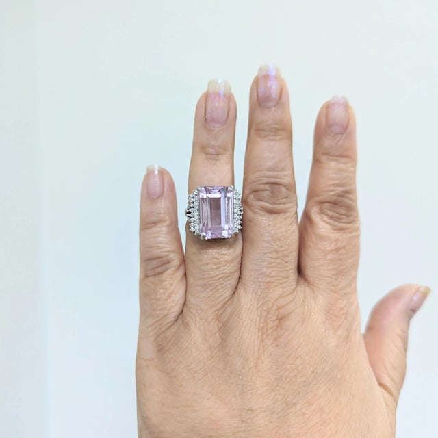 Beautiful 22.65 ct. pink kunzite emerald cut with 0.51 ct. good quality white diamond rounds. Handmade in 18k white gold....