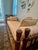 A classic antique 'Jenny Lind' style Spool/Spindle Daybed with trundle. Custom Upholstered in the 1980's. The solid wood...