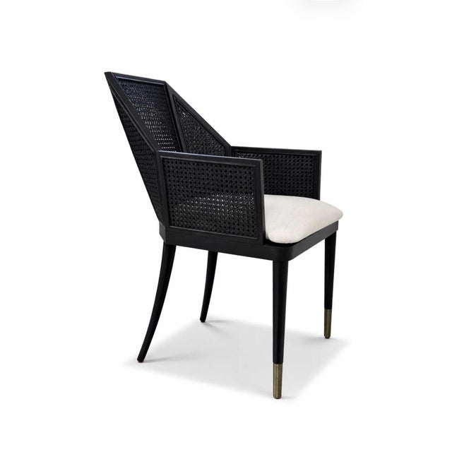 Beautiful double cane dining chairs designed by Kara Mann for Baker/McGuire’s Milling Road Collection. Blackened walnut...