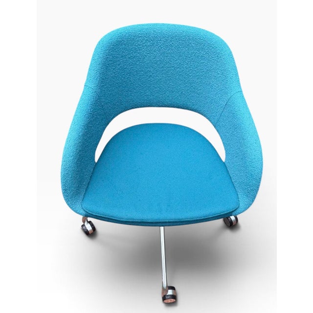 Sculptural swivel chair from Source International’s Martini collection, designed by Gemma Bernal (b. Barcelona, 1949), a...